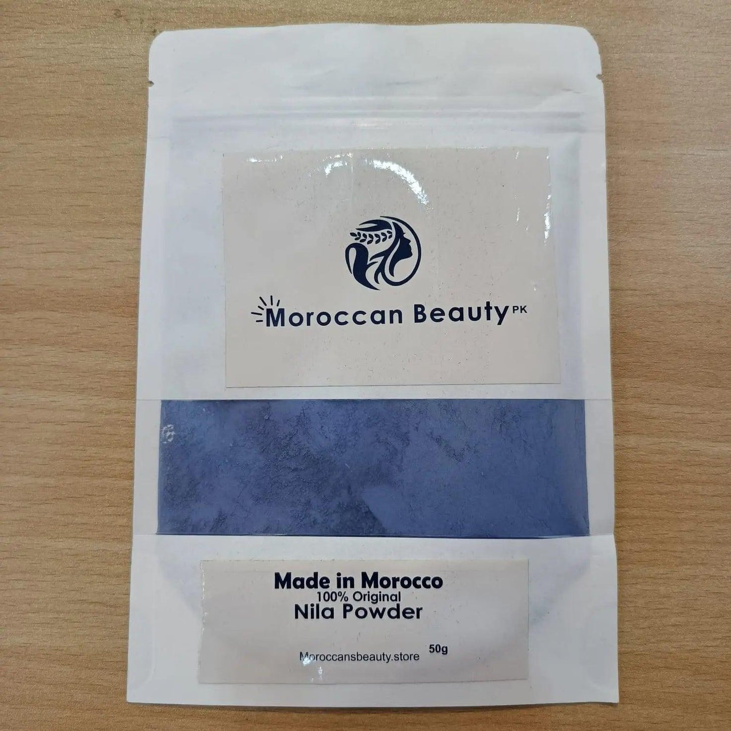 Front view of 50g Moroccan Beauty Nila Blue Powder pack for natural skin brightening and hair treatment