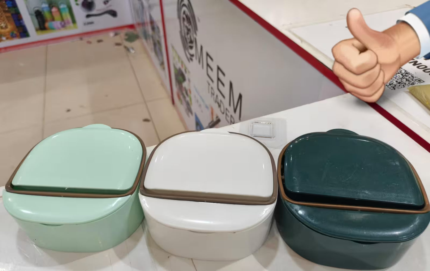 Wall-mounted adhesive soap holder with drainage tray, waterproof bathroom soap dish available in white, green, and mint colors for keeping soap dry and organized.