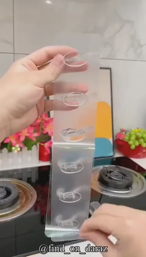 Video demonstrating the installation and everyday use of a self-adhesive wall hook strip (Hook Patti) for hanging towels, keys, kitchen utensils, bathroom accessories, and household items without drilling.